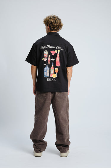 Bonkers Corner Signature Happy Hour oversized shirt in XS, featuring a relaxed fit and graphic design on soft fabric.