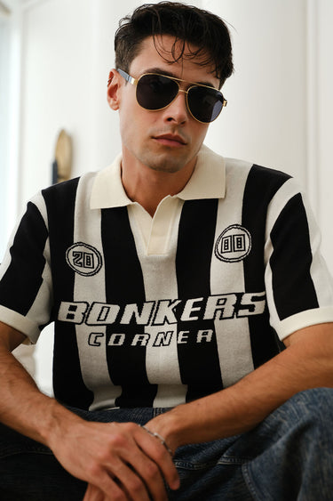 Bonkers Corner Signature Knit Polo shirt in XS, featuring a classic knit design and collar for a stylish casual look.