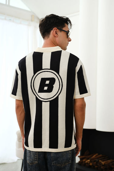 Bonkers Corner Signature Knit Polo shirt in XS, featuring a classic knit design and collar, displayed on a plain background.