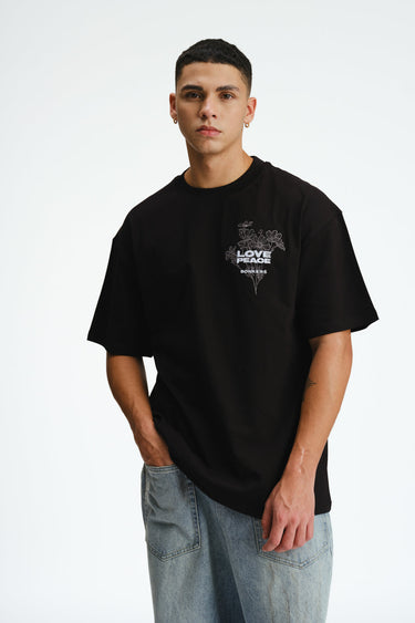 Bonkers Corner Signature Love and Peace premium oversized T-shirt in XS, featuring a relaxed fit and peace-themed design.