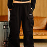Black Stealth 4 Pocket Pant by Bonkers Corner, showing the slim-fit design with four front pockets and durable fabric.