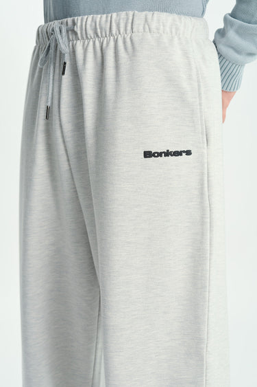 Bonkers Corner Studio Mist loose fit joggers in light gray, showing relaxed fit and comfortable elastic waistband.