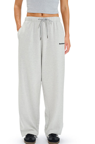 Bonkers Corner Studio Mist loose fit joggers in light fabric, showing their relaxed style and comfortable fit.