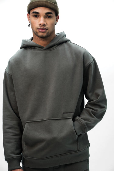 Taupe Wear A Hug oversized hoodie by Bonkers Corner, showing a cozy, oversized fit with a soft fabric texture.