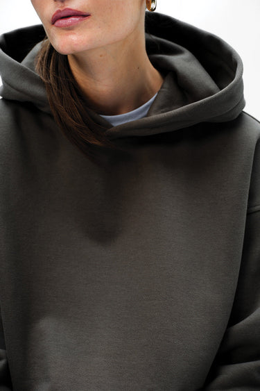 Taupe oversized hoodie from Bonkers Corner's Wear A Hug collection, featuring a relaxed fit and cozy fabric.