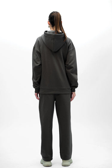 Taupe Wear A Hug oversized hoodie by Bonkers Corner, featuring a relaxed fit and soft fabric, shown in a close-up view.