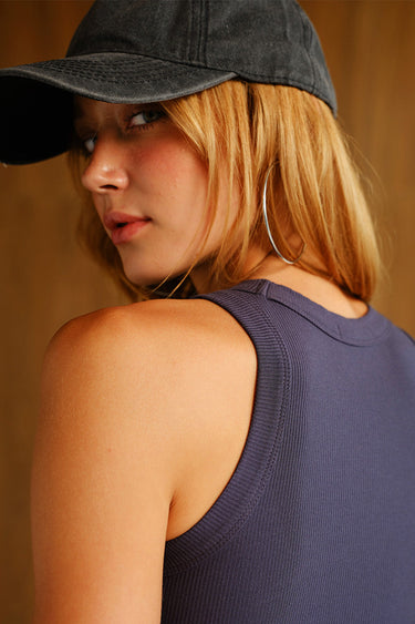 Bonkers Corner Tencel Celestial Daze ribbed modal tank top, lightweight and fitted, shown in natural light with a close-up of fabric texture.