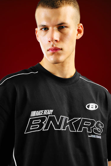 Bonkers Corner Trackside Oversized T-shirt in grey, featuring bold graphic design and relaxed fit for casual wear.