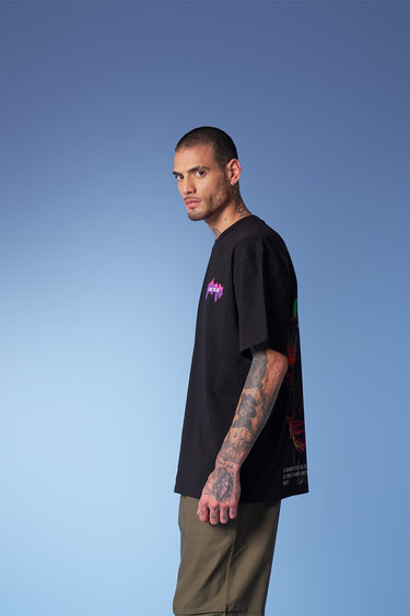 Bonkers Corner oversized Travis Scott Utopia T-shirt in XS displayed on a hanger with graphic design and bold branding.