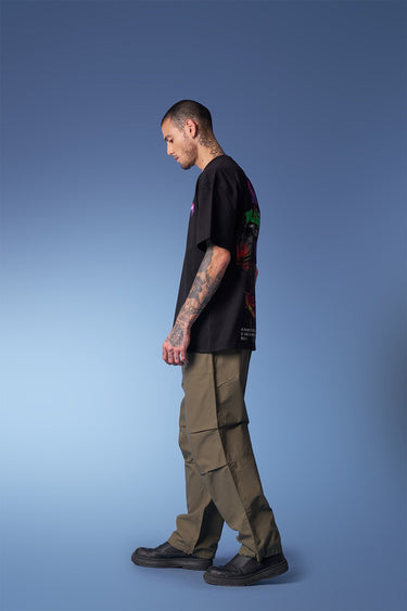 Bonkers Corner oversized Travis Scott Utopia T-shirt displaying graphic design on the front in white and black.