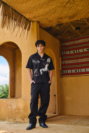 Bonkers Corner Warrior Alicorn oversized shirt featuring a colorful unicorn design on soft fabric.
