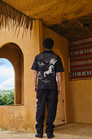 Bonkers Corner Warrior Alicorn oversized shirt featuring a colorful alicorn design on soft fabric.