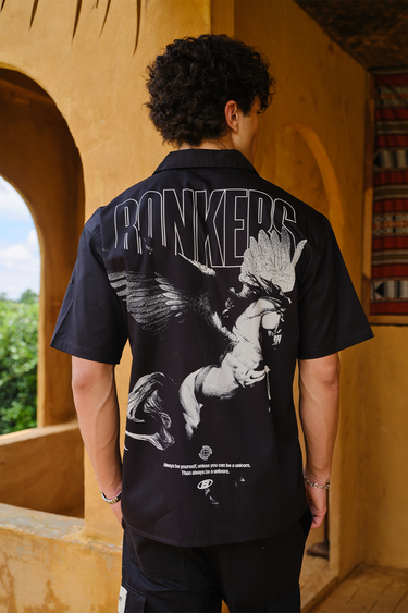 Bonkers Corner Warrior Alicorn oversized shirt featuring a colorful alicorn graphic on soft, comfortable fabric.