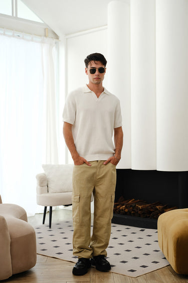 White knit polo T-shirt by Bonkers Corner featuring a classic collar and short sleeves, displayed on a plain background.