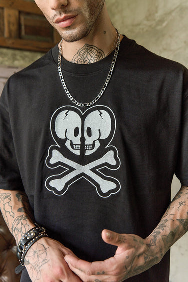 Bonkers Corner Heart of Skulls oversized T-shirt featuring a bold skull graphic on soft fabric in a relaxed fit.