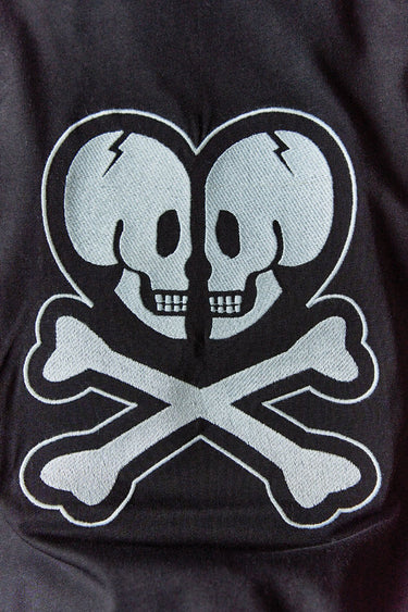 Bonkers Corner Heart Of Skulls oversized T-shirt featuring a skull graphic design on soft fabric.