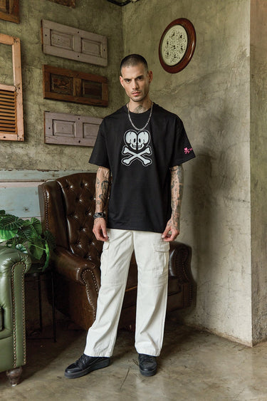 Bonkers Corner Heart of Skulls oversized T-shirt featuring a bold skull graphic design on soft fabric.