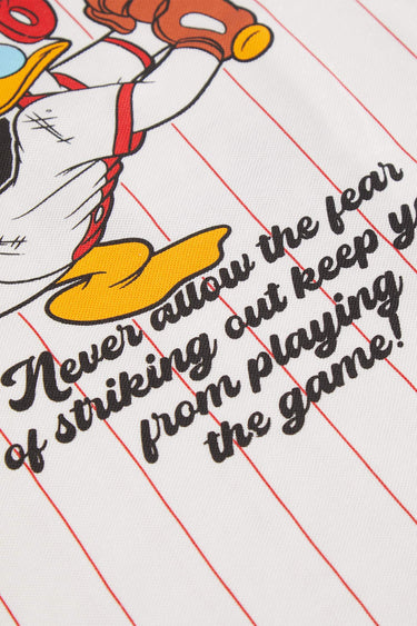 Donald Duck 34 oversized jersey by Bonkers Corner, featuring a colorful cartoon print and comfortable fit on a model.
