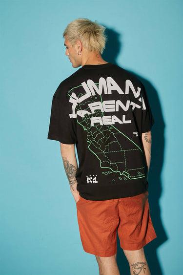 Oversized Bonkers Corner "Humans Aren't Real" T-shirt in XXS with bold graphic print on soft cotton fabric.