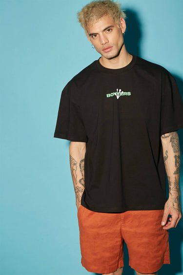 Bonkers Corner oversized T-shirt with "Humans Aren't Real" slogan, in XS size, black cotton casual wear.