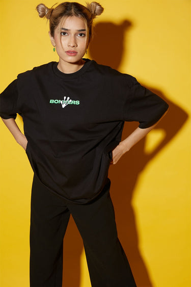 Bonkers Corner oversized T-shirt featuring "Humans Aren't Real" graphic in black, casual fit, shown flat on a white background.