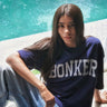 Navy blue oversized T-shirt by Bonkers Corner with signature logo, relaxed fit, and soft cotton fabric.