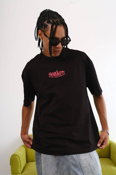 Black oversized T-shirt featuring a main character graphic from BonkersCorner store, casual fit and bold design.