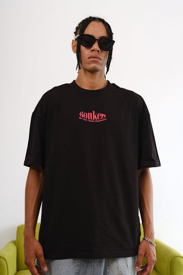 Black oversized T-shirt featuring the main character design from BonkersCorner store, casual fit, front view.