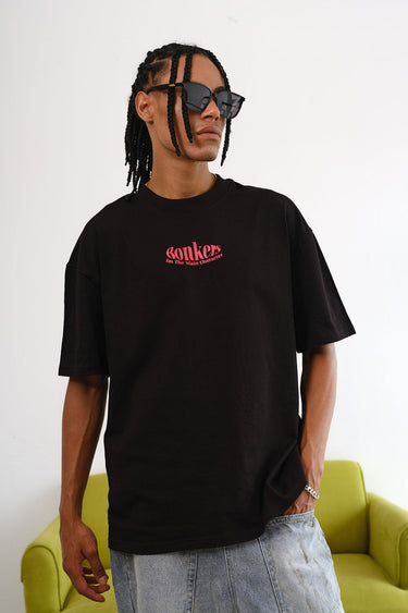 Black oversized T-shirt featuring a main character graphic from BonkersCorner store, casual fit, and comfortable design.