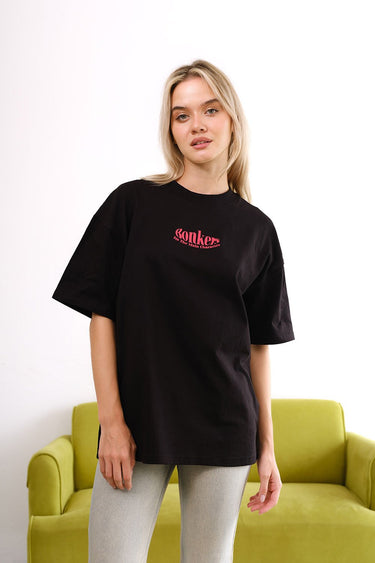 Black oversized T-shirt featuring a main character graphic from BonkersCorner, casual fit, front view.