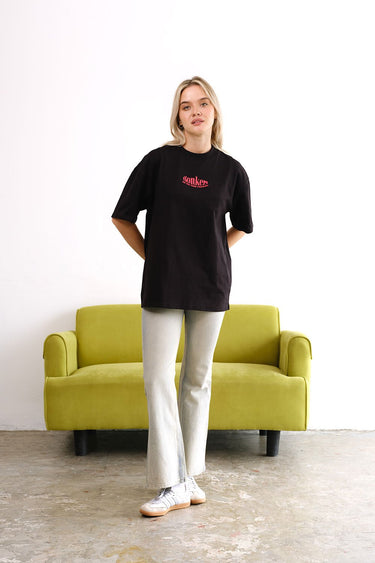 Black oversized T-shirt featuring a main character graphic from BonkersCorner, casual fit, front view.