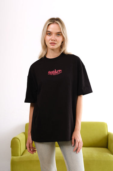 Black oversized T-shirt featuring a main character graphic, stylish fit, from BonkersCorner store.