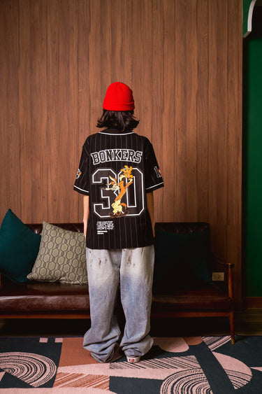 BonkersCorner Hit Man Tune jersey in XS with vibrant design, featuring team logo and athletic fit for sports or casual wear.