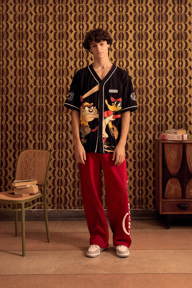 BonkersCorner Hit Man Tune Jersey in XS size, featuring vibrant sports design and breathable fabric for active wear.