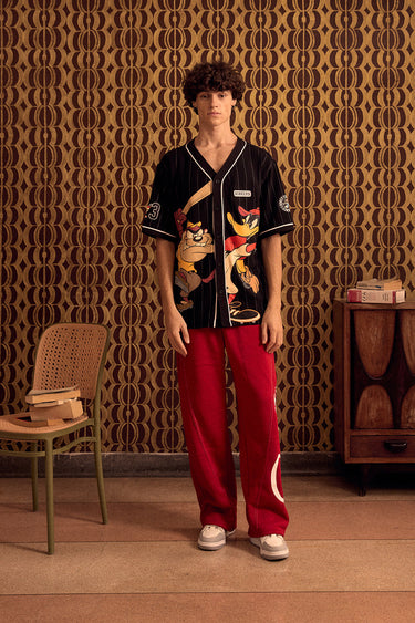 BonkersCorner Hit Man Tune jersey in XS, featuring vibrant colors and athletic fit, ideal for sports fans and casual wear.