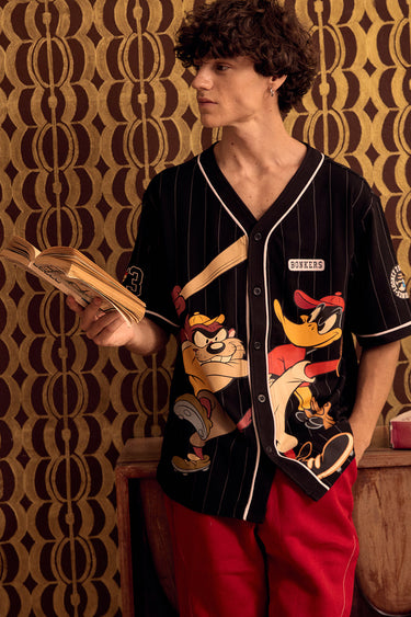 BonkersCorner Hit Man Tune Jersey in size XS showing vibrant design and sports jersey details on a plain background.