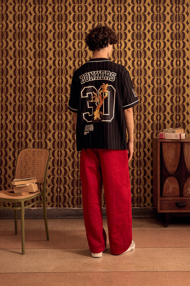 BonkersCorner Hit Man Tune Jersey in XS with vibrant design, featuring bold graphics and comfortable fit for sports or casual wear.