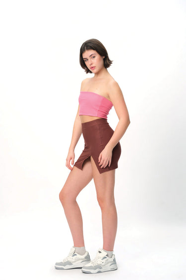 Mocha solid A-line slit skirt by BonkersCorner store, displayed on a model showing the flowy fabric and stylish design.