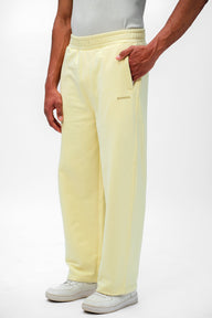 Light pink Pale Bloom BonkersCorner everyday joggers with a relaxed fit and elastic waistband, shown on a model.