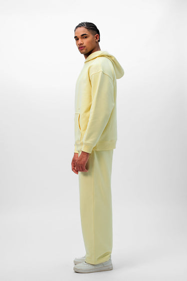 Light pink Pale Bloom BonkersCorner everyday joggers laid flat, showcasing soft fabric and relaxed fit for casual wear.